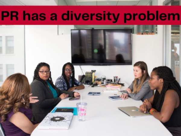 PR has a diversity problem: 5 women with different skin tones sitting around a table, deep in discussion, in a boardroom